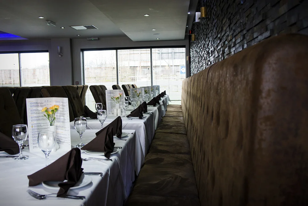Tables arranged for group dining at Bombay 8