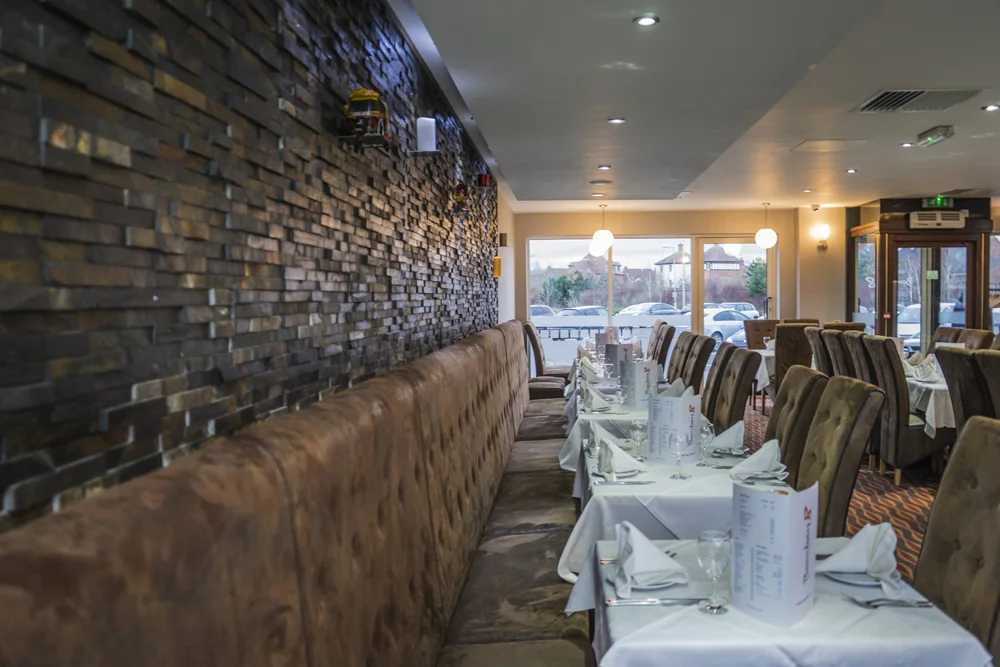 The Bombay 8 dining room prepared for service